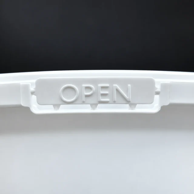 OPEN tab on the basin body